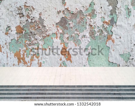Texture concrete floor with old wall. Studio table room background.