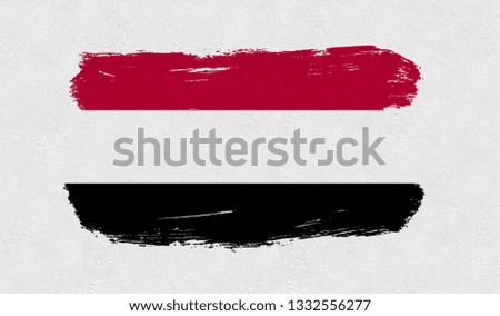 Yemen   flag on the wall.