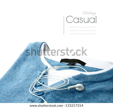 Concept image for youths and students. Studio close up of non-branded casual clothes and MP3 buds. Copy space.