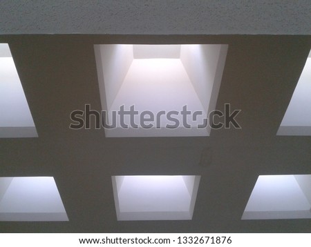 The interior of the building is designed to have natural light channels to illuminate the interior so that the interior of the building has natural light to save electricity.
