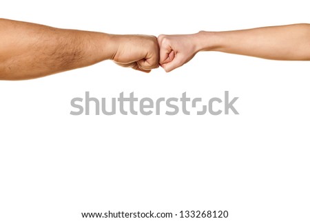 male and female hand hitting with fists on white background