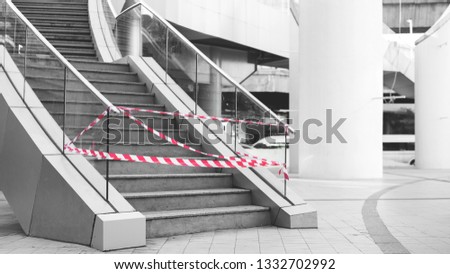 Do not cross the line caution tape. Don't go up the stairs in white and red lines 