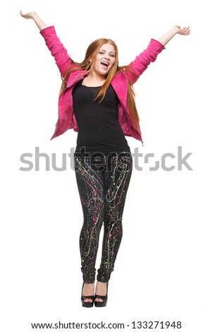 Portrait of a teenage girl with hands up in the air