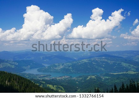 Bicaz lake seen from Ceahlau mountain in Romania on a summer day