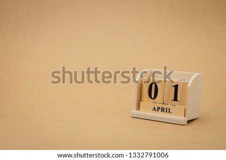 April 1st wooden calendar on vintage wood abstract background. April Fools' Day is actually just around the corner  April 1 with copy space for your text.