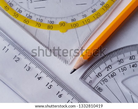 Measurement tools and a pencil