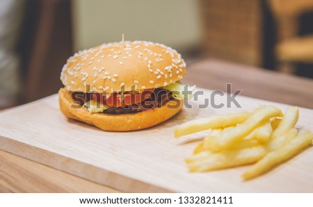 Gourmet hamburger and fries