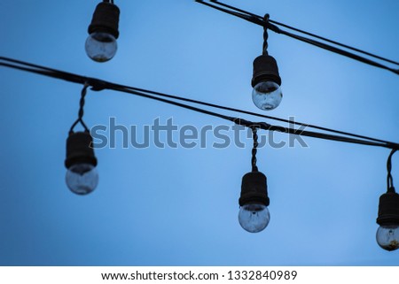 Hanging christmas lights for decoration.Thailand