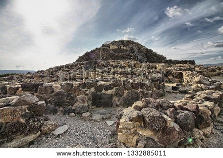 View of archeological nuragic complex of Su Nuraxi di Barumini. UNESCO World Heritage List Royalty-Free Stock Photo #1332885011