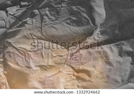 Texture of crumpled recycled brown paper