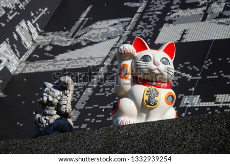 The maneki-neko or beckoning cat in city Tokoname Japan Mar 10th 2018
It is a common Japanese figurine (lucky charm, talisman) which is often believed to bring good luck to the owner