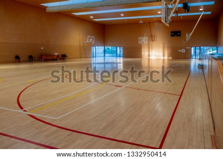 interior of a sports hall without anyone before playing Royalty-Free Stock Photo #1332950414