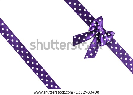 Shiny purple silk ribbon isolated on white background. Festive concept. Flat lay.