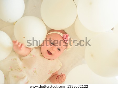 This is my baby. Sweet little baby. New life and birth. Childhood happiness. Small girl. Happy birthday. Family. Child care. Childrens day. Portrait of happy little child in white balloons.