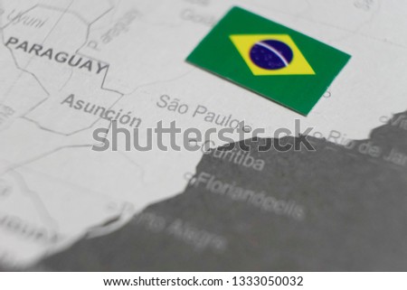 Brazilian flag placed on Sao Paulo map of world map