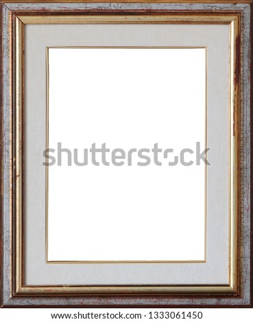 Old vintage wooden frame painted with silver and gold cracked patina with white canvas mat.