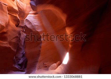 Antelope Canyon. The light enter into the narrow canyon walls creating beautiful colours in the sandstone rock. Lower Antelope Canyon,  Navajo Nation, Arizona, USA.