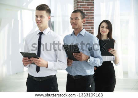 portrait of an Executive business team on office background