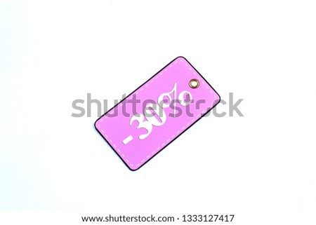 Colorful tag or label, isolated on white background. Close-up. Copy space.