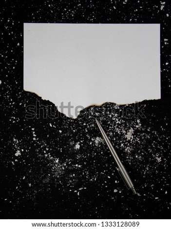 white paper on black background