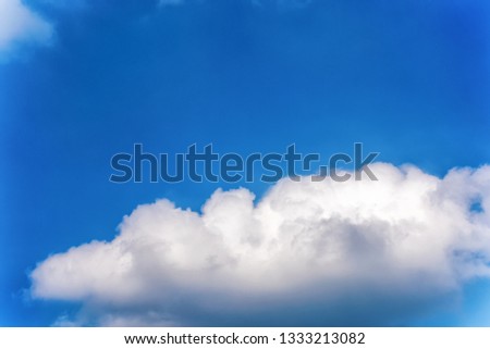 Fluffy white clouds on background of blue sky wallpaper