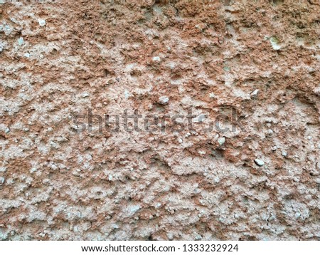 Abstract wall texture with light pink plaster. Stucco background.
