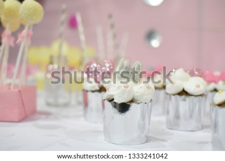 Sweet table and delicious cakes for first birthday. Candy bar with sweet cakes