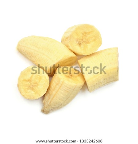 Banana slices isolated on white background. Flat lay, top view