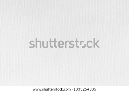 Snow white canvas background. Surface of fabric texture in white winter color.