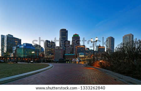 Boston Financial District at Sunset viewing from Fan Pier Park, Boston, Massachusetts, USA