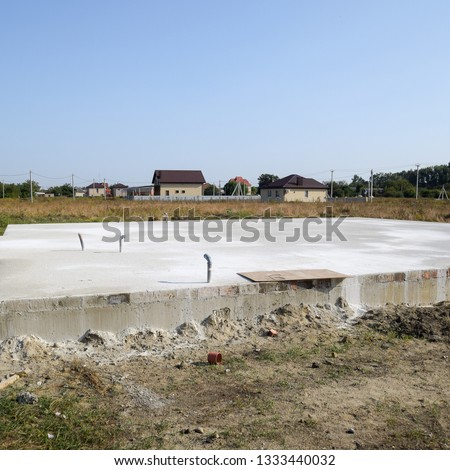 Filled foundation of the house and floors. Home construction