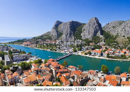 Town Omis in Croatia - travel background Royalty-Free Stock Photo #133347503