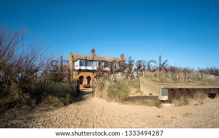 Golf club house on Brancaster beach, North Norfolk, UK