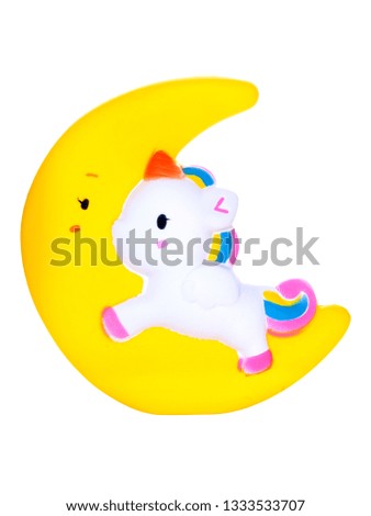 unicorn and yellow moon on a white background