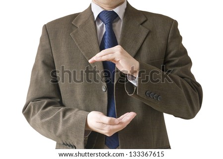 Conceptual image of a businessman holding something with empty space for design isolated on white background