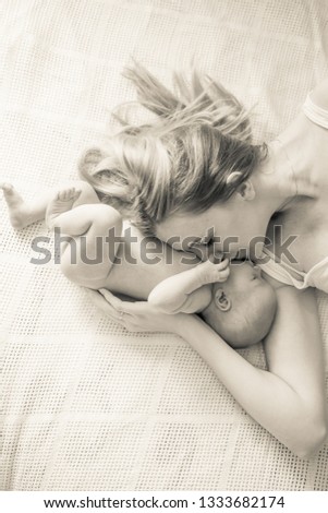 happy mother with her sweet newborn daughter.