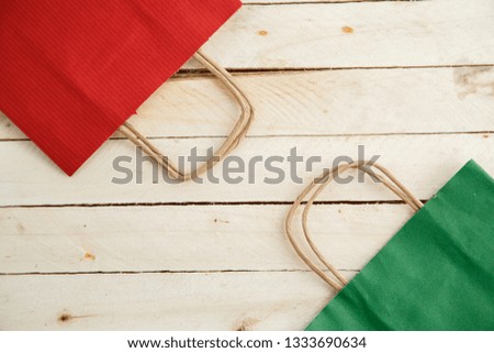 Cardboard bags on a wooden isolated background. Top view