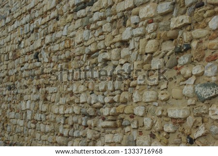 Old stone brick wall texture photo. 