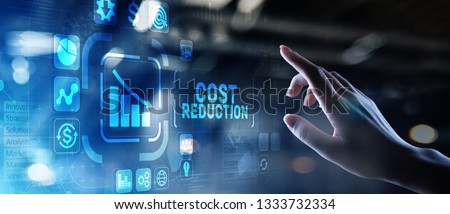 Cost reduction business finance concept on virtual screen. Royalty-Free Stock Photo #1333732334