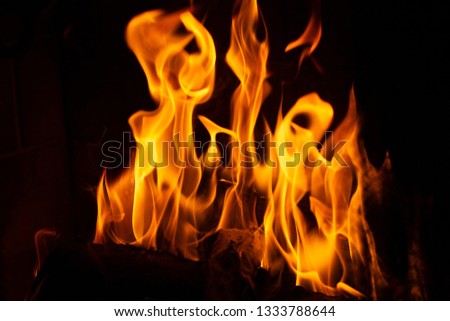 flames from a fire in a fireplace