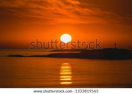 orange sunset at atlantic ocean road