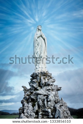 Statue of Praying Virgin Mary.