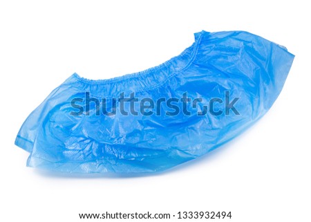 disposable blue shoe covers for hospital visits isolated on white background Royalty-Free Stock Photo #1333932494