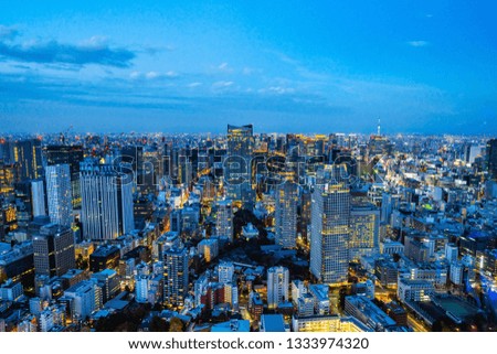 Asia Business concept for real estate and corporate construction - panoramic urban city skyline aerial night view with twilight sky in Tokyo, Japan