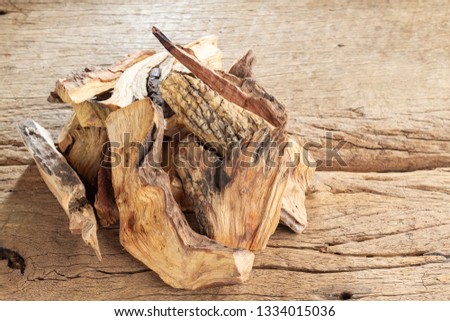 Sacred wood "palo santo" - Bursera graveolens,on rustic wood background