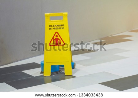 Warning signs are cleaning Shopping mall