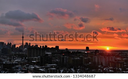 Toronto cityscape photos at dawn with sunrise over Lake Ontario