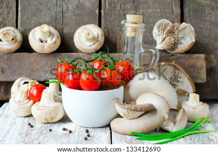 Fresh tomatoes with mushrooms and spices, Selective focus