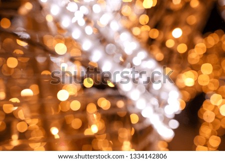 Golden bokeh lights as abstract background. Texture