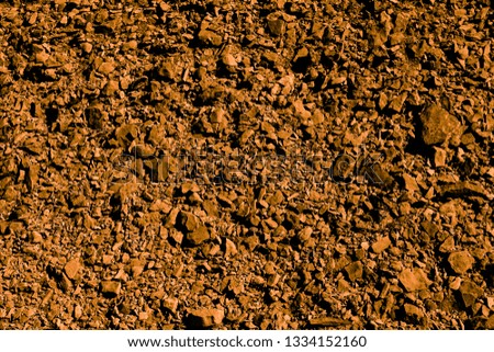 Gold colored land of Sumerians on the territory of burial mounds in Bahrain. Dilmun civilization. Background and Texture. High resolution